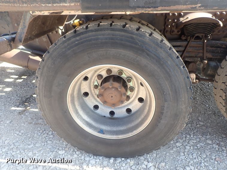 image for item DG2204 2009 Freightliner Business Class M2  roll-off container truck