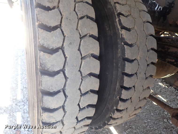 image for item DG2204 2009 Freightliner Business Class M2  roll-off container truck