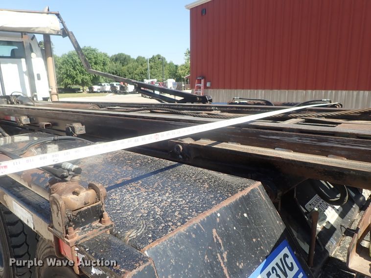 image for item DG2204 2009 Freightliner Business Class M2  roll-off container truck