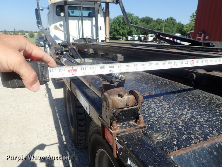 image for item DG2204 2009 Freightliner Business Class M2  roll-off container truck