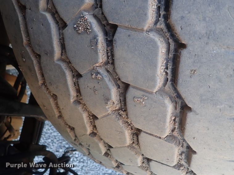 image for item DG2204 2009 Freightliner Business Class M2  roll-off container truck