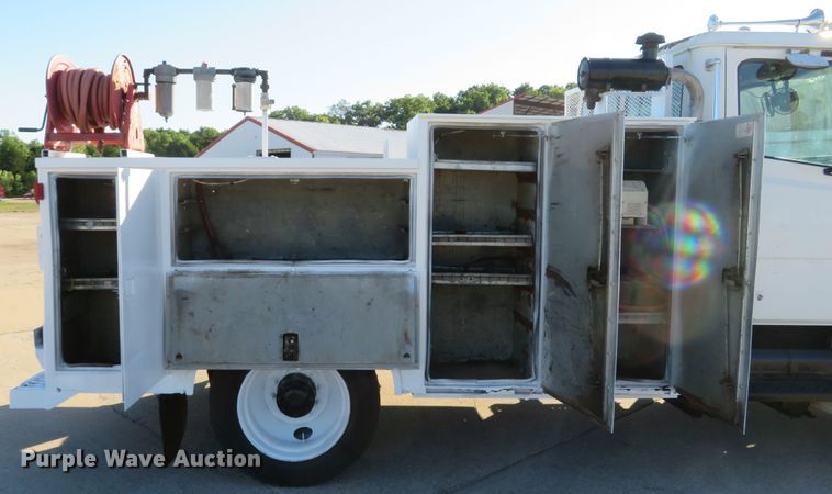 image for item DH1013 2000 Freightliner FL70  service truck