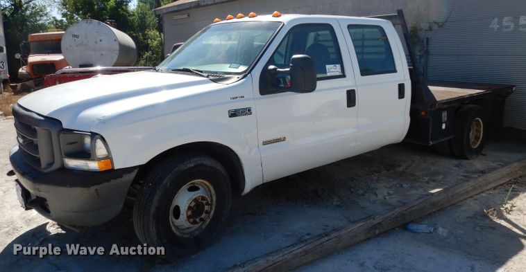 image for item DG6796 2004 Ford F350 Super Duty  Crew Cab flatbed pickup truck