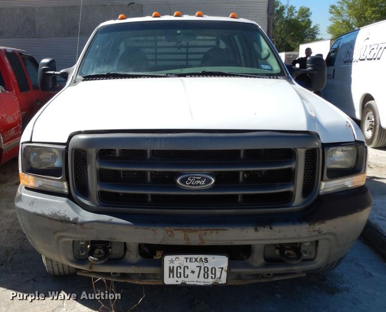 image for item DG6796 2004 Ford F350 Super Duty  Crew Cab flatbed pickup truck