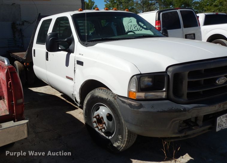 image for item DG6796 2004 Ford F350 Super Duty  Crew Cab flatbed pickup truck