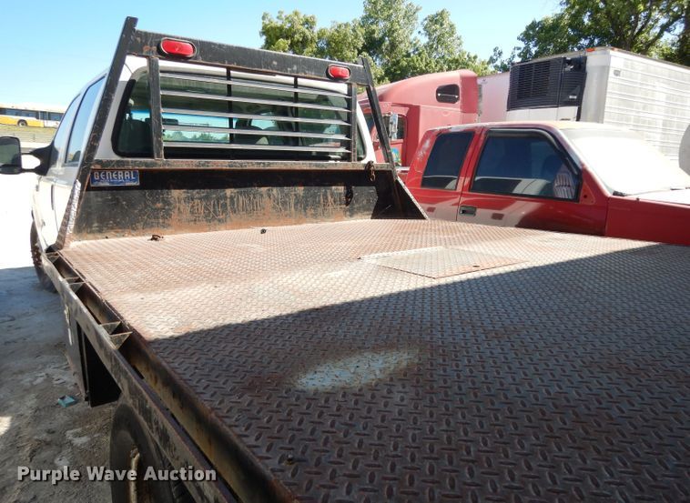 image for item DG6796 2004 Ford F350 Super Duty  Crew Cab flatbed pickup truck