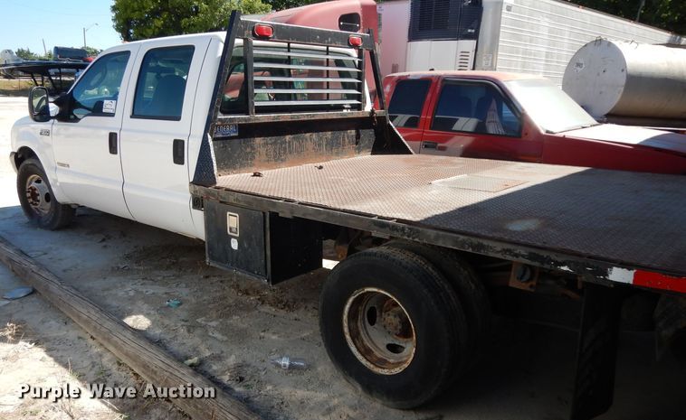 image for item DG6796 2004 Ford F350 Super Duty  Crew Cab flatbed pickup truck