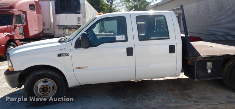 image for item DG6796 2004 Ford F350 Super Duty  Crew Cab flatbed pickup truck