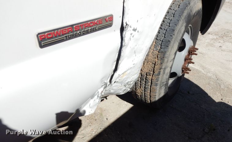 image for item DG6796 2004 Ford F350 Super Duty  Crew Cab flatbed pickup truck