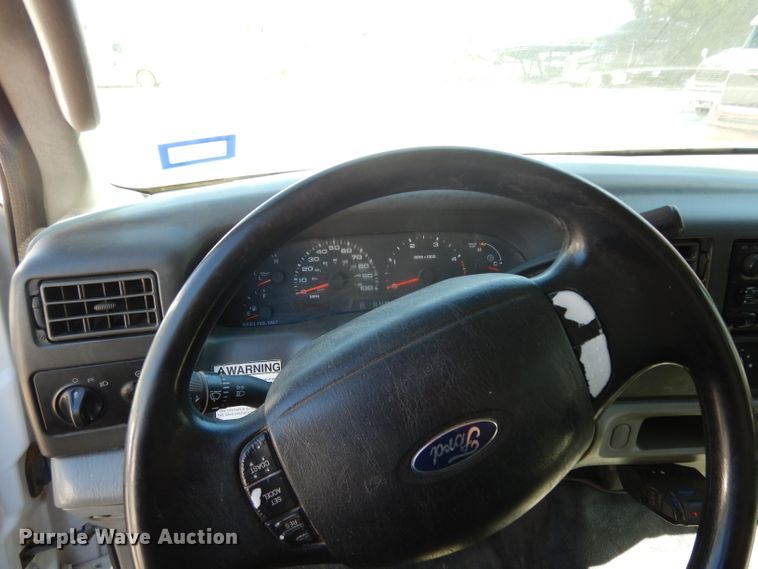 image for item DG6796 2004 Ford F350 Super Duty  Crew Cab flatbed pickup truck