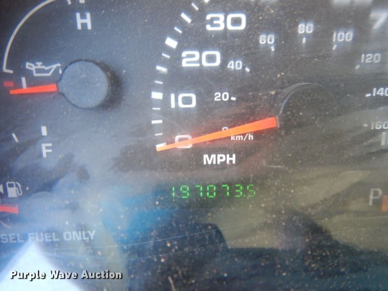 image for item DG6796 2004 Ford F350 Super Duty  Crew Cab flatbed pickup truck