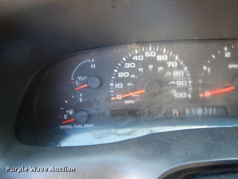 image for item DG6796 2004 Ford F350 Super Duty  Crew Cab flatbed pickup truck