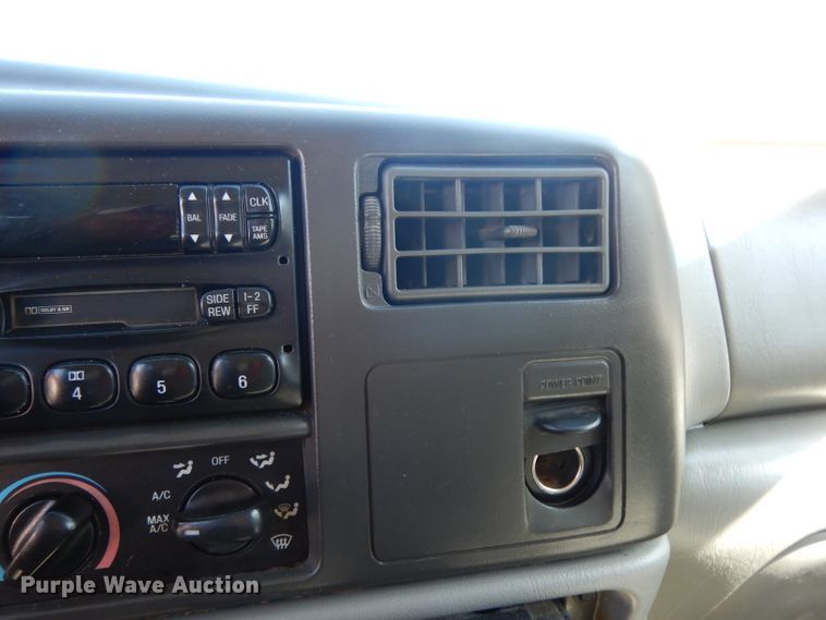 image for item DG6796 2004 Ford F350 Super Duty  Crew Cab flatbed pickup truck