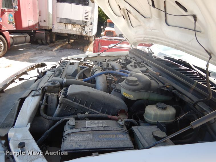 image for item DG6796 2004 Ford F350 Super Duty  Crew Cab flatbed pickup truck