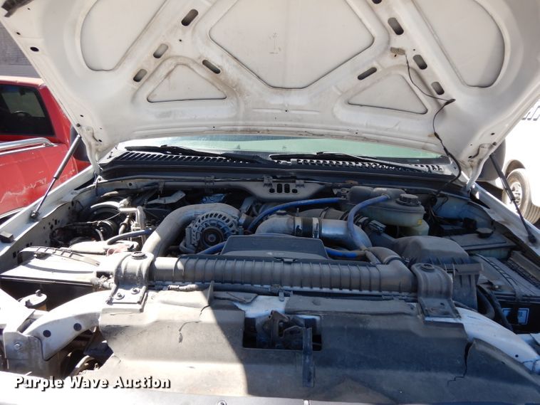 image for item DG6796 2004 Ford F350 Super Duty  Crew Cab flatbed pickup truck