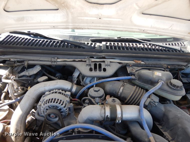 image for item DG6796 2004 Ford F350 Super Duty  Crew Cab flatbed pickup truck