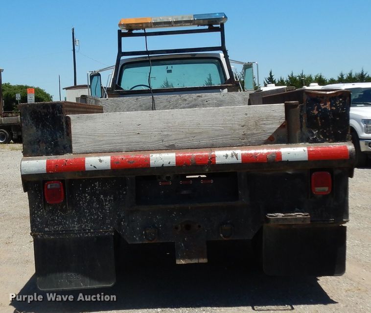 image for item DG6800 1993 Ford F700  flatbed truck