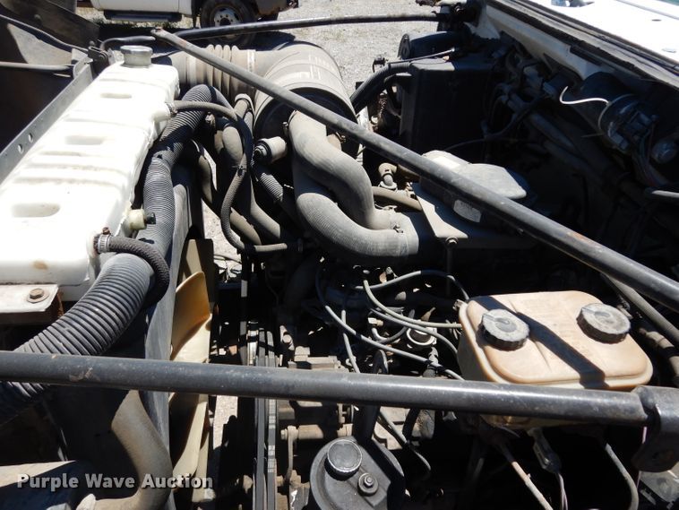 image for item DG6800 1993 Ford F700  flatbed truck