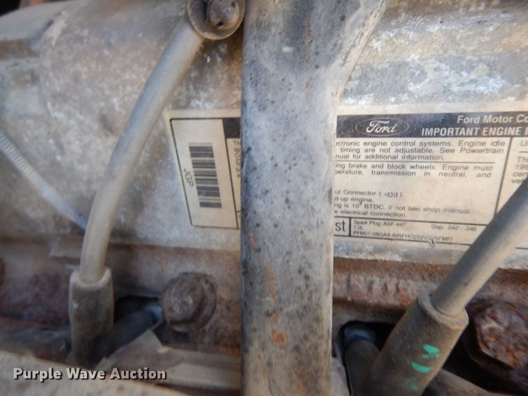 image for item DG6800 1993 Ford F700  flatbed truck