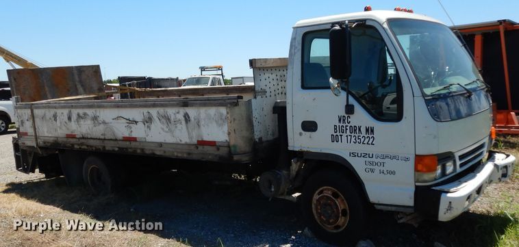 image for item DG6801 1999 Isuzu NPR  flatbed truck