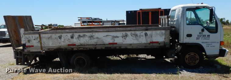 image for item DG6801 1999 Isuzu NPR  flatbed truck