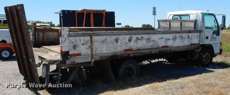 image for item DG6801 1999 Isuzu NPR  flatbed truck