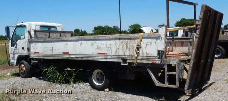 image for item DG6801 1999 Isuzu NPR  flatbed truck