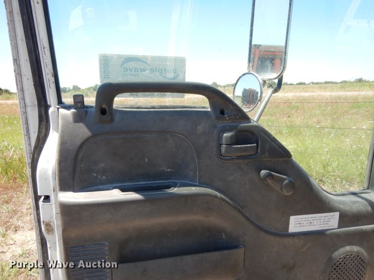 image for item DG6801 1999 Isuzu NPR  flatbed truck