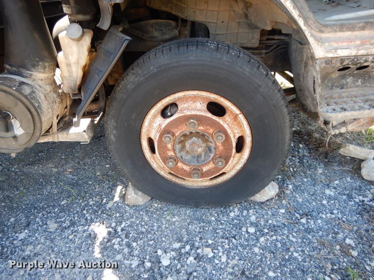 image for item DG6801 1999 Isuzu NPR  flatbed truck