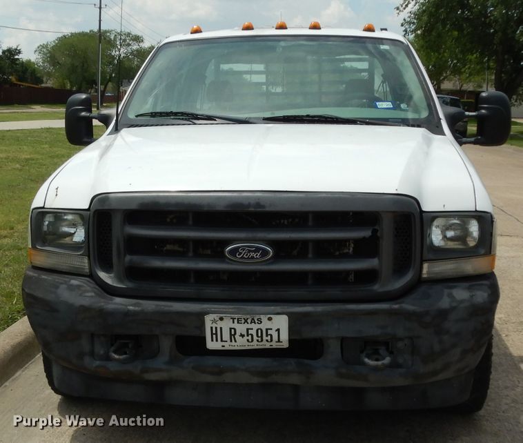 image for item DG6805 2002 Ford F350 Super Duty  Crew Cab flatbed pickup truck