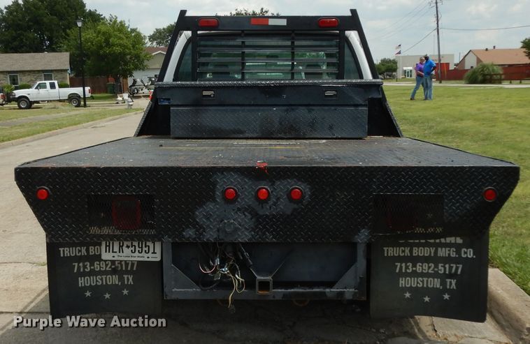 image for item DG6805 2002 Ford F350 Super Duty  Crew Cab flatbed pickup truck