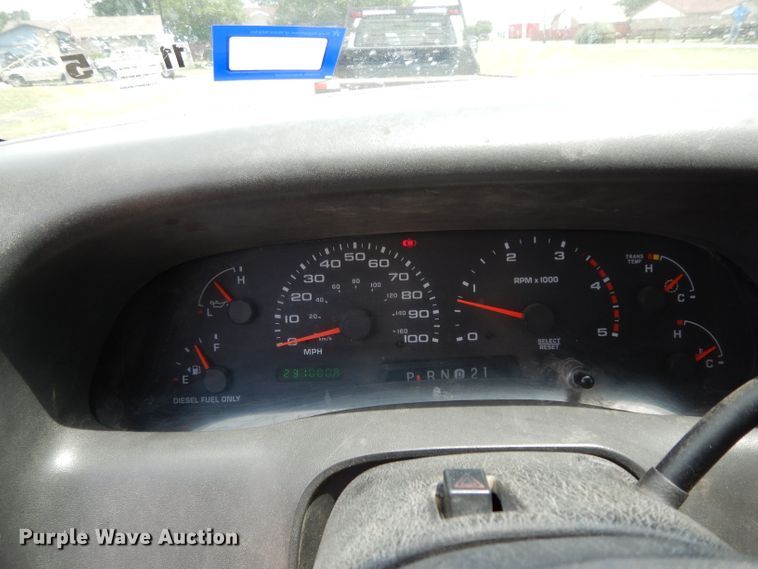 image for item DG6805 2002 Ford F350 Super Duty  Crew Cab flatbed pickup truck