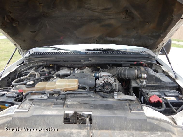 image for item DG6805 2002 Ford F350 Super Duty  Crew Cab flatbed pickup truck