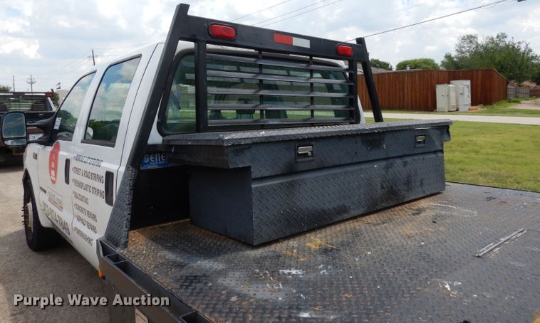 image for item DG6805 2002 Ford F350 Super Duty  Crew Cab flatbed pickup truck