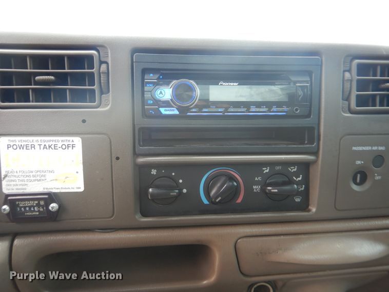 image for item DG8673 2001 Ford F550 Super Duty  utility bed pickup truck with crane