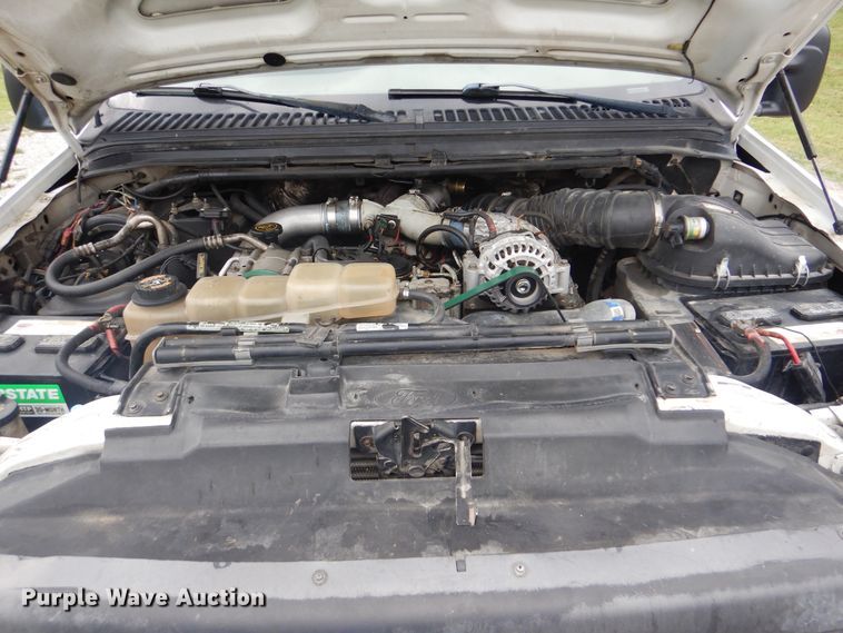 image for item DG8673 2001 Ford F550 Super Duty  utility bed pickup truck with crane