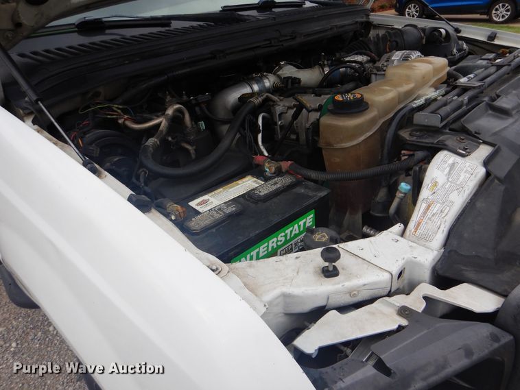 image for item DG8673 2001 Ford F550 Super Duty  utility bed pickup truck with crane