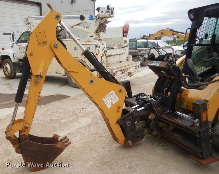 image for item GN9452 2002 Caterpillar BH-30W skid steer backhoe attachment