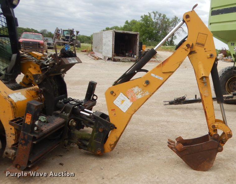 image for item GN9452 2002 Caterpillar BH-30W skid steer backhoe attachment