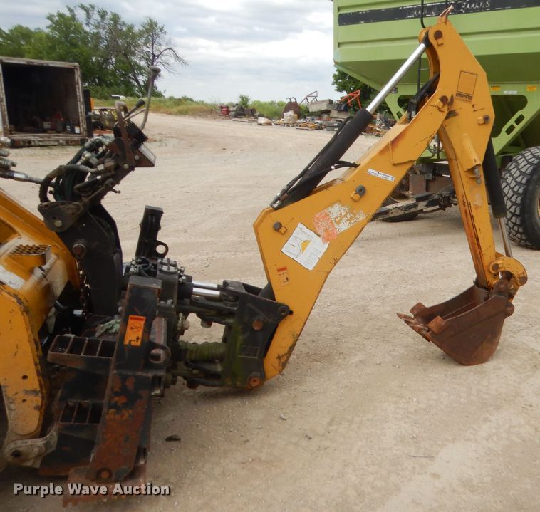 image for item GN9452 2002 Caterpillar BH-30W skid steer backhoe attachment