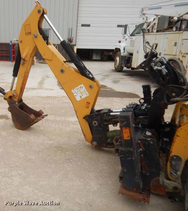 image for item GN9452 2002 Caterpillar BH-30W skid steer backhoe attachment