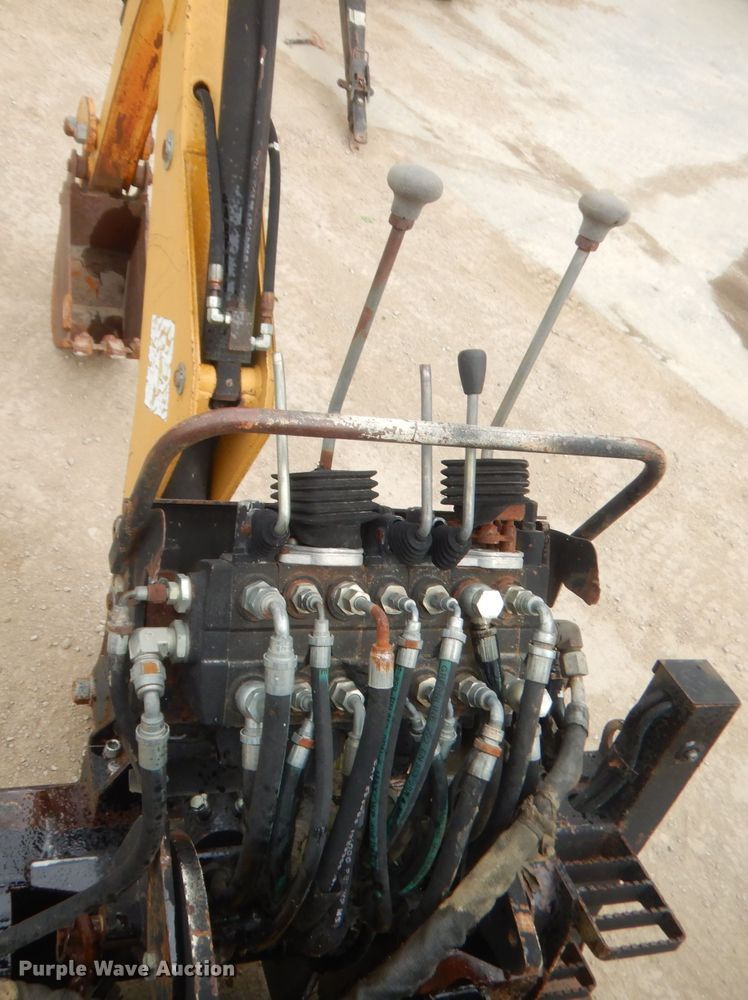 image for item GN9452 2002 Caterpillar BH-30W skid steer backhoe attachment