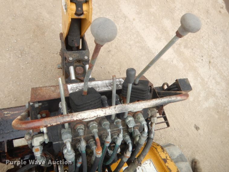 image for item GN9452 2002 Caterpillar BH-30W skid steer backhoe attachment