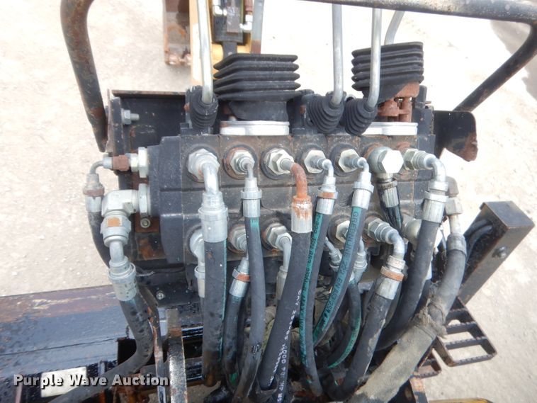 image for item GN9452 2002 Caterpillar BH-30W skid steer backhoe attachment