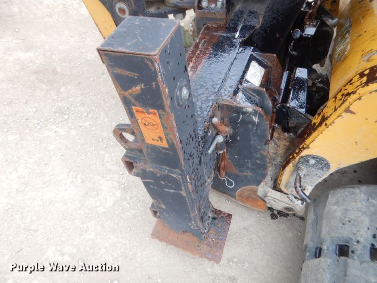 image for item GN9452 2002 Caterpillar BH-30W skid steer backhoe attachment