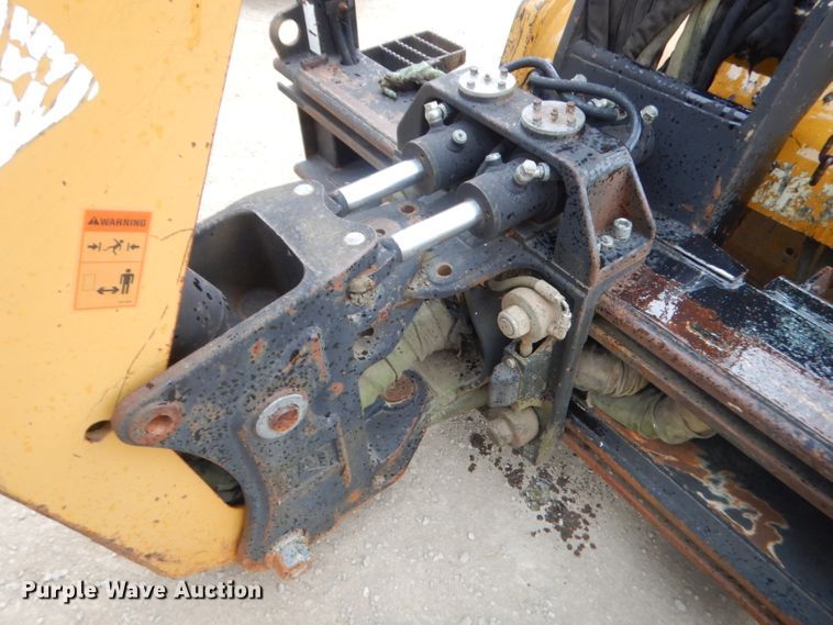 image for item GN9452 2002 Caterpillar BH-30W skid steer backhoe attachment