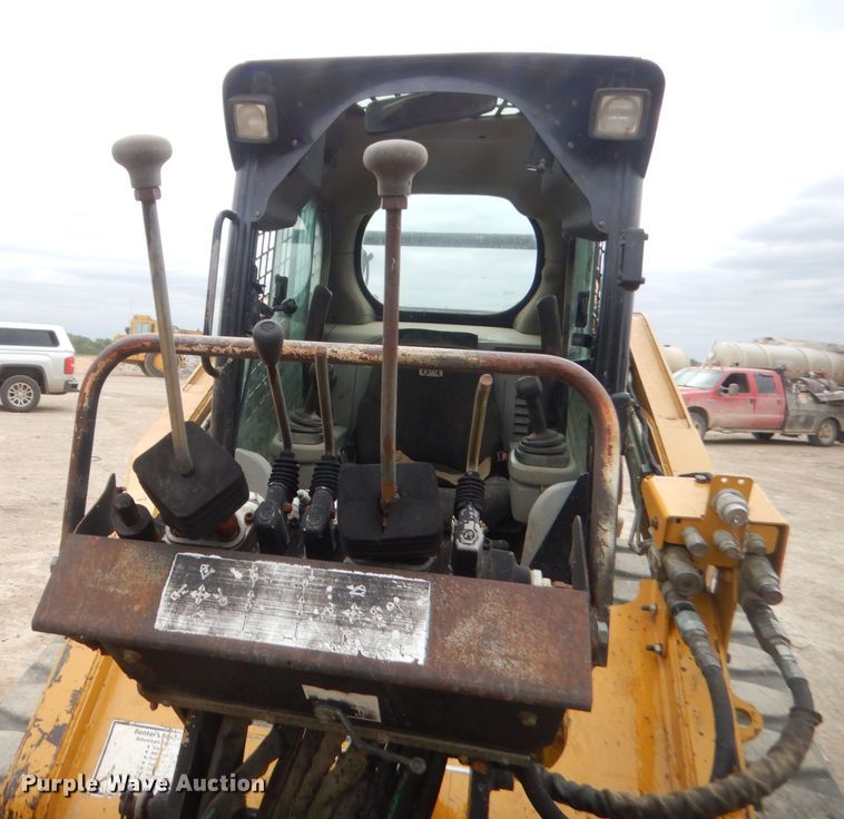 image for item GN9452 2002 Caterpillar BH-30W skid steer backhoe attachment