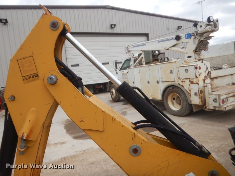 image for item GN9452 2002 Caterpillar BH-30W skid steer backhoe attachment