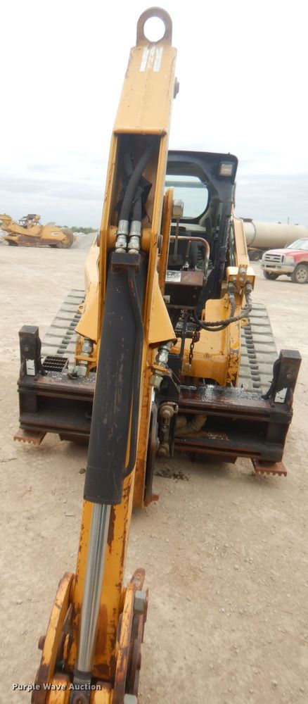 image for item GN9452 2002 Caterpillar BH-30W skid steer backhoe attachment