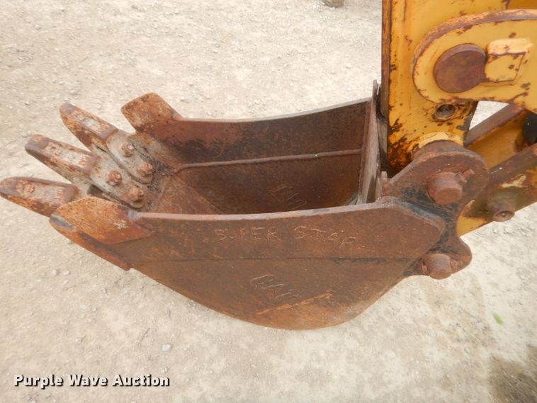 image for item GN9452 2002 Caterpillar BH-30W skid steer backhoe attachment